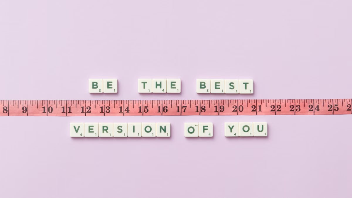 Motivational phrase 'Be the Best Version of You' with a measuring tape on purple background.